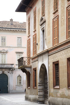 Fascinating old historical palace and narrow stone streets near the sunny lakefront of Lake Como Italy