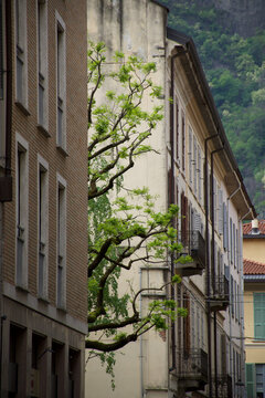 Fascinating old historical palace and narrow stone streets near the sunny lakefront of Lake Como Italy