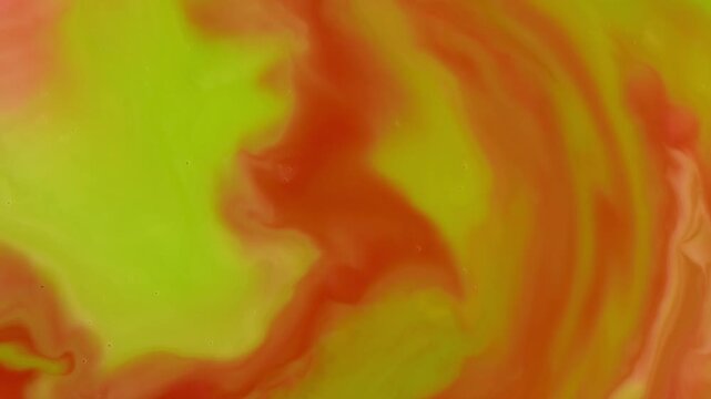 Abstract Fluid Art Macro - Swirling Lime Green and Orange Paint Ripples