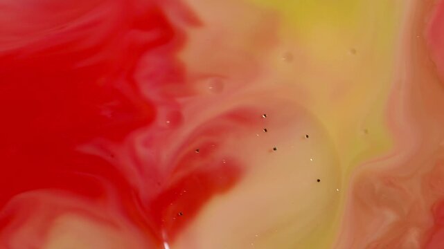 Abstract Luxury Fluid Art - Gold Glitter Flakes Floating in Peach and Red Liquid