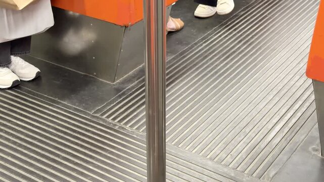 In Helsinki Metro Train with Orange Interior and Doors Opening