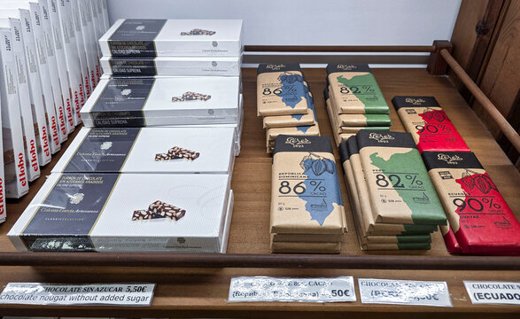 XALO, SPAIN - JUNE 20, 2026.Selection of P&eacute;rez and El Lobo dark chocolate bars and turr&oacute;n at gourmet bodega in Xal&oacute;