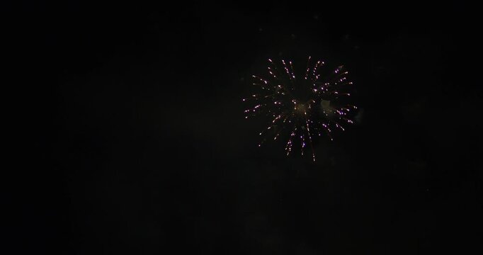 Colorful Sparks From Fireworks Bursting In Night Sky In Utah
