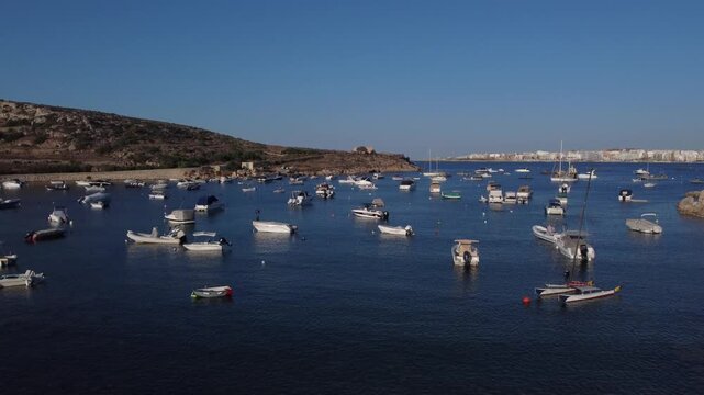 Malta, Mstra Bay, aerial view of Mistra Battery built by the Order of Saint John in 18th Century. Coastal fortification. Establishing shot. High quality 4k footage