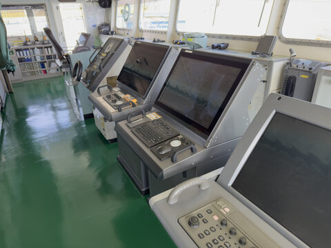 cargo ship navigation bridge. navigation, nautical equipment. marine technology and electonic devices.