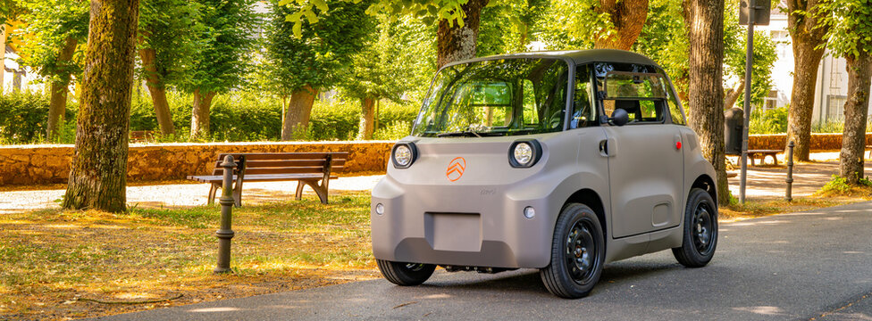 New 2026 Citroen Ami electric microcar parked in a small french town