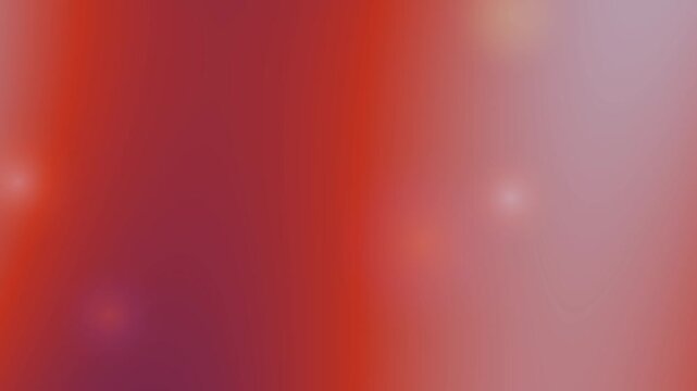Soft abstract gradient background blending warm red and cool green tones with subtle lens flare and bokeh effects