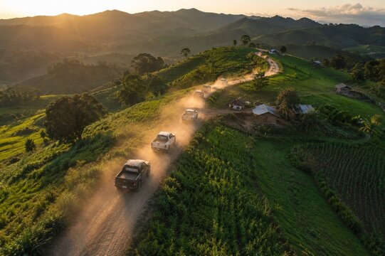 Off road convoy on mountain dirt road
