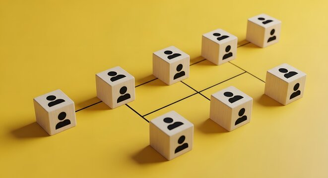 Wooden cubes showing organizational chart on yellow background