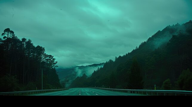 View of an asphalt road at night