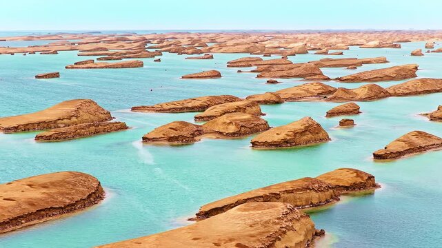 Stunning aerial view of the unique Water Yadan landform with turquoise water in Qinghai, China.
