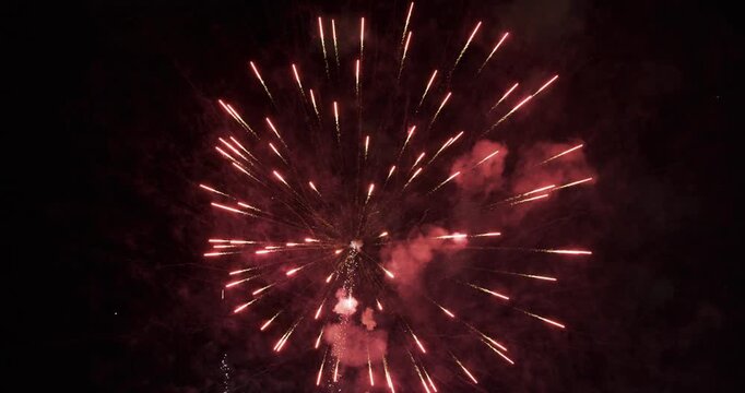 Red Sparks Fanning Outward Through Smoke-Filled Night Sky In Provo, utah