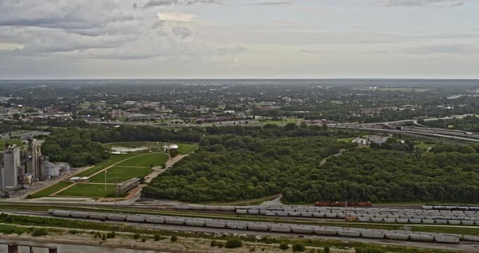 St Louis Missouri Aerial v10 circular pan shot revealing a sustainable green waterfront city with two bridges crossing over mississippi river to east illinois - Inspire 2, X7 camera - August 2020