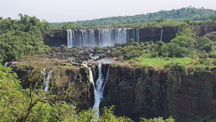 Panoramic view of Iguazu Falls cascades and jungle landscape. © Eze
