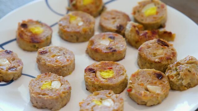 Learn how to make Filipino embutido with simple steps and ingredients in a home kitchen. The process of making Filipino embutido in a home kitchen. Watch how the ingredients are mixed and shaped into 