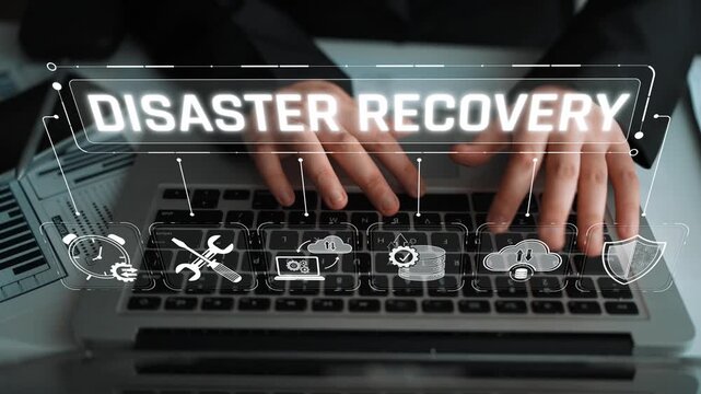 Hands typing on laptop keyboard with disaster recovery concept graphic overlay, technology support for business continuity and data protection strategies Sigmoid