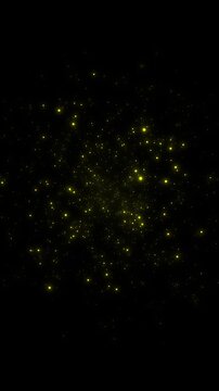 Magical golden glowing particles and fireflies bursting from center in seamless loop, vertical format
