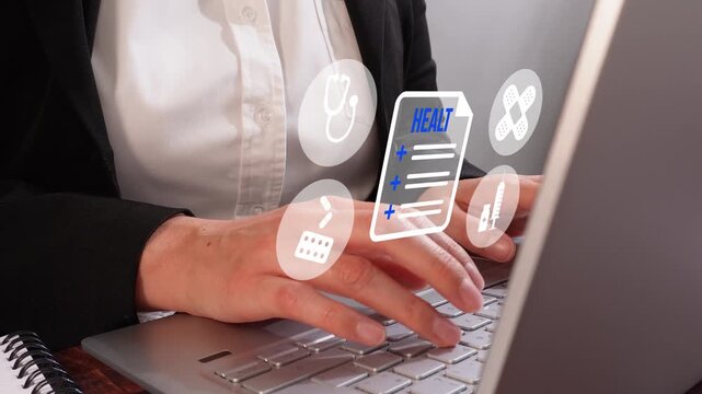Focused hands typing on a laptop keyboard with floating digital icons displaying health-related tasks. Ideal for the healthcare sector and digital planning.