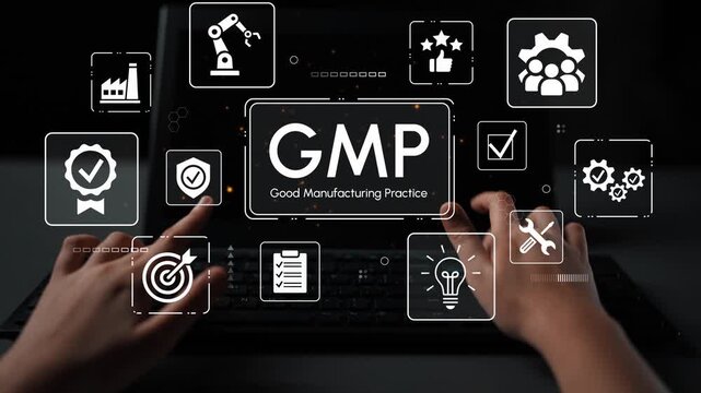 Hands on Keyboard with GMP Icons Representing Good Manufacturing Practices and Industry Standards for Quality Control and Efficiency in Production Processes. Entropy.