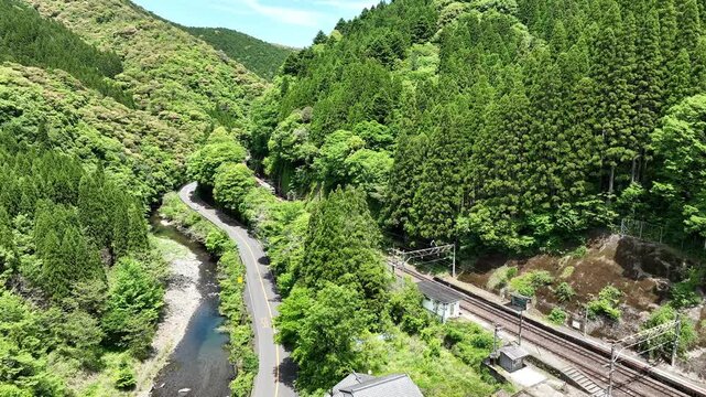 Long Freight Train Passing Remote Sōtarō Station on the Nippo Main Line, Japan
