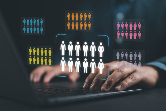 Target market or audience. Marketing segmentation strategy and analysis. Marketer using laptop computer to research customer data.