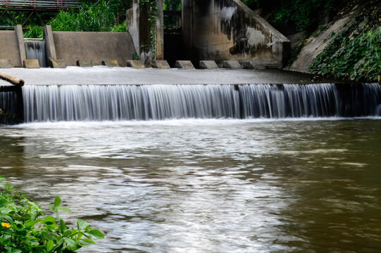 A small dam used to slow the flow of water.
