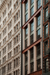 Fototapeta premium Soho & Chinatown Street Photography in Manhattan, New York City. Rich details of Iron casted Facade of old New York. Historic and modern architecture of NYC.