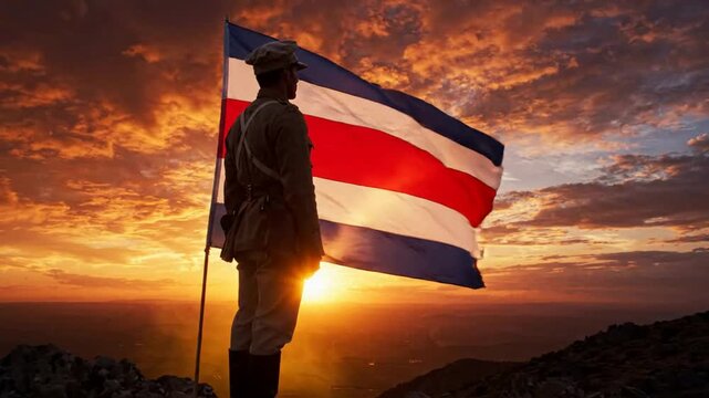 Soldier holding costa rica flag at sunset on mountain peak, patriotic military tribute, national pride and heroic concept, cinematic golden hour