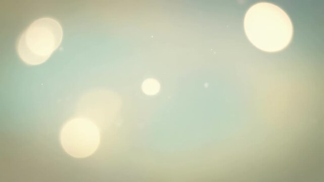 Gentle glowing bokeh effect featuring soft round light orbs drifting across serene pastel background, creating calming atmosphere