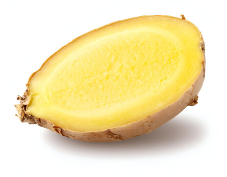 A thick slice of fresh yellow ginger root showing its fibrous inner texture against a plain white background