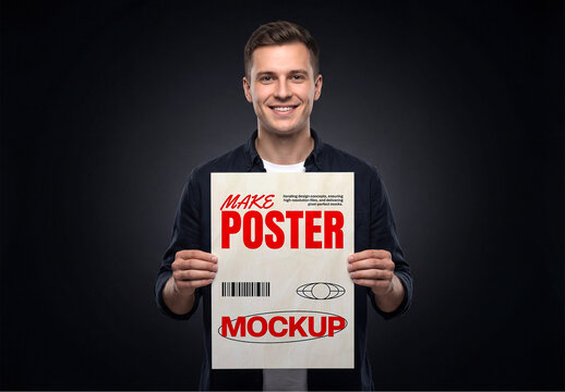 Man Holding Paper Poster Mockup