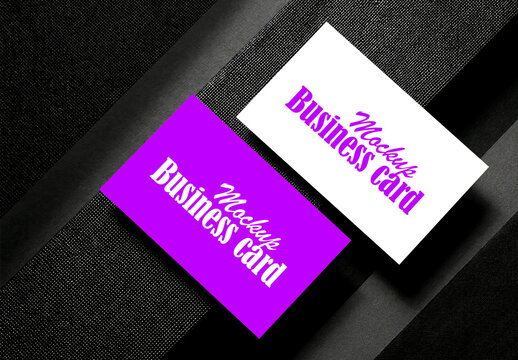Business card mockup on black textured