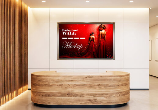 Horizontal screen mockup behind modern office reception desk