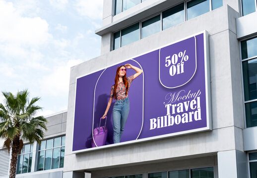 Large outdoor travel billboard mockup on modern building facade