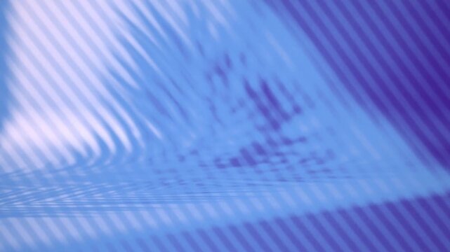 Abstract blue background with diagonal stripes and soft tropical palm leaf shadow overlay
