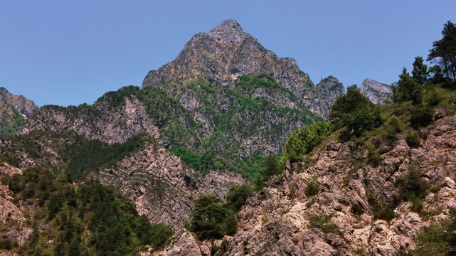 Friulian Dolomites mountain range on a bright summer day. Beautiful scenic mountain backdrop.