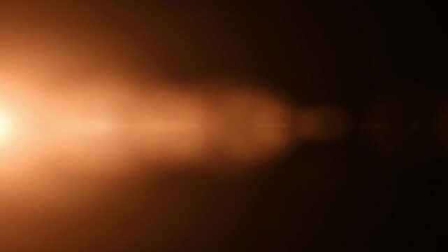 A video showcasing a vibrant and dramatic light beam in a dark environment