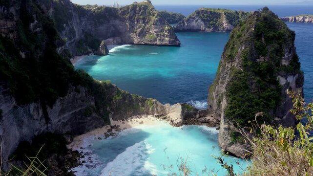 Diamond Beach (Pantai Diamond)  in Nusa Penida, Bali, Indonesia. Shot from near Thousand Islands Viewpoint looking down on the white shores, dramatic limestone cliffs and crystal clear water. 