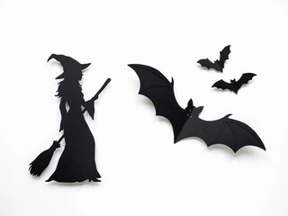 Fototapeta premium Halloween decorations with witch and bats cutouts