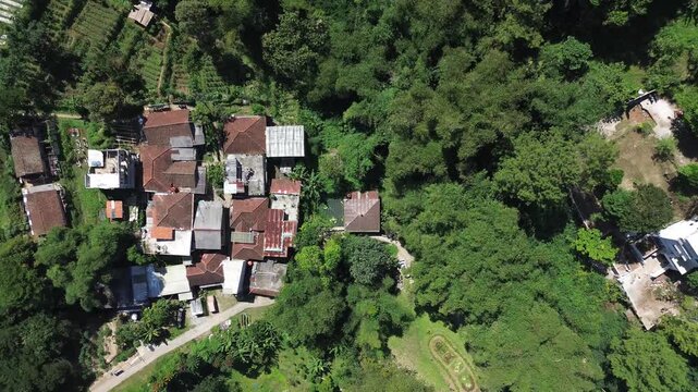 Aerial view of lush forest covering the hills in Bandung, West Java, Indonesia