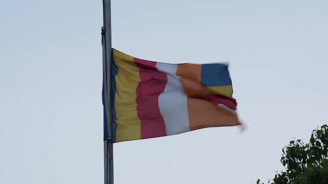 A Buddhist Flag on a windy day