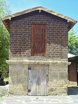 Traditional granary building with stone and brick walls. Quintadona, Norte - Portugal