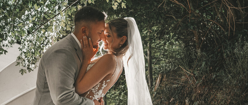  happy, laughing bride and groom at the wedding. Celebrate an emotional wedding.