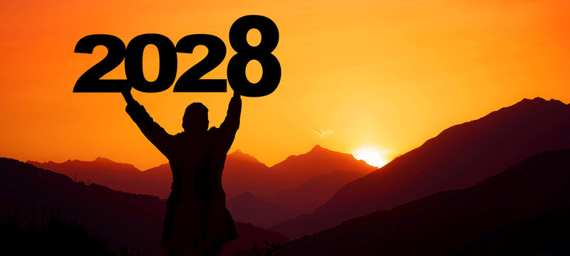 Landscape background banner panorama 2028 - Breathtaking view with black silhouette of mountains and man holding year, in the morning during the sunrise