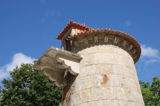Traditional stone tower structure with a tiled roof. Paco de Ferreira, Norte - Portugal