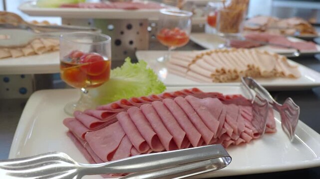 Delicious spread of cold cuts and appetizers at a gathering