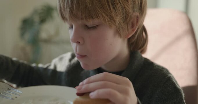 Kid Boy Eat Rice and Sausage. Eating Breakfast Lunch in Kitchen. 4K 10-bit