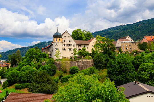 Scenic view of the medieval Deuring castle with its iconic baroque round tower in the upper town of Bregenz, Austria
