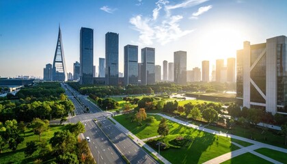 Fototapeta premium Aerial view of modern city skyline with sunrise glow.