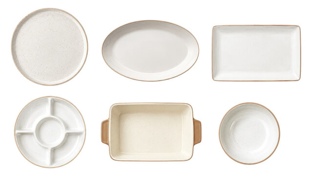 Six white ceramic dishes and serving pieces including plates, bowl, divided tray and rectangular baking dish shown in overhead flat-lay on transparent background